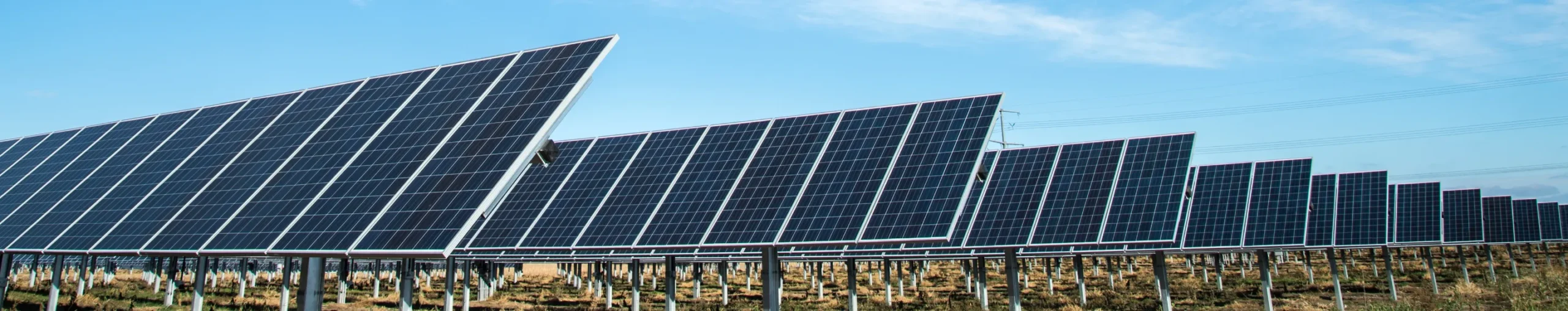 Solar panel rows in field
